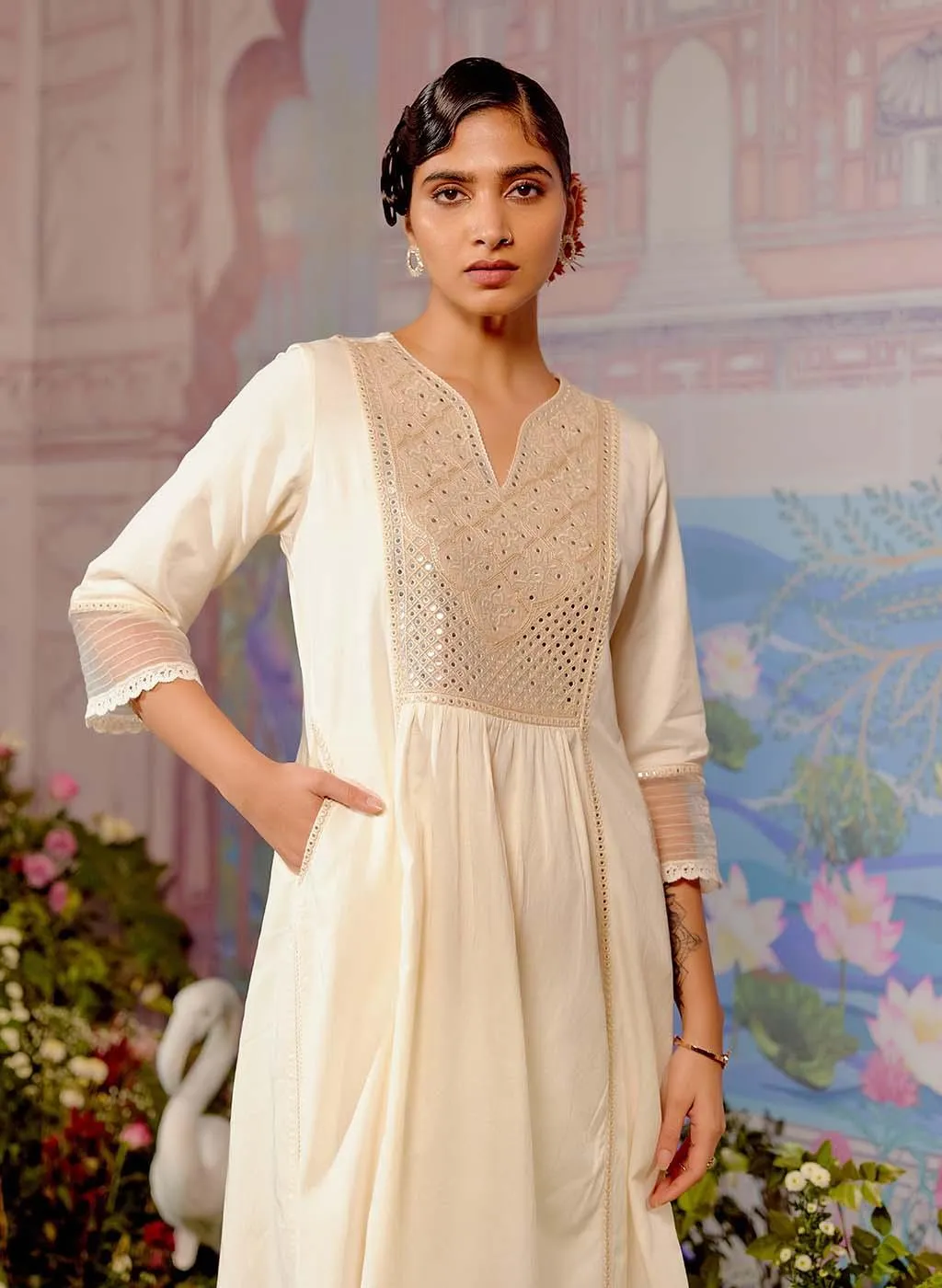 Ivory Knee-length Kurta with Asymmetric Hem and 3/4th Sleeves